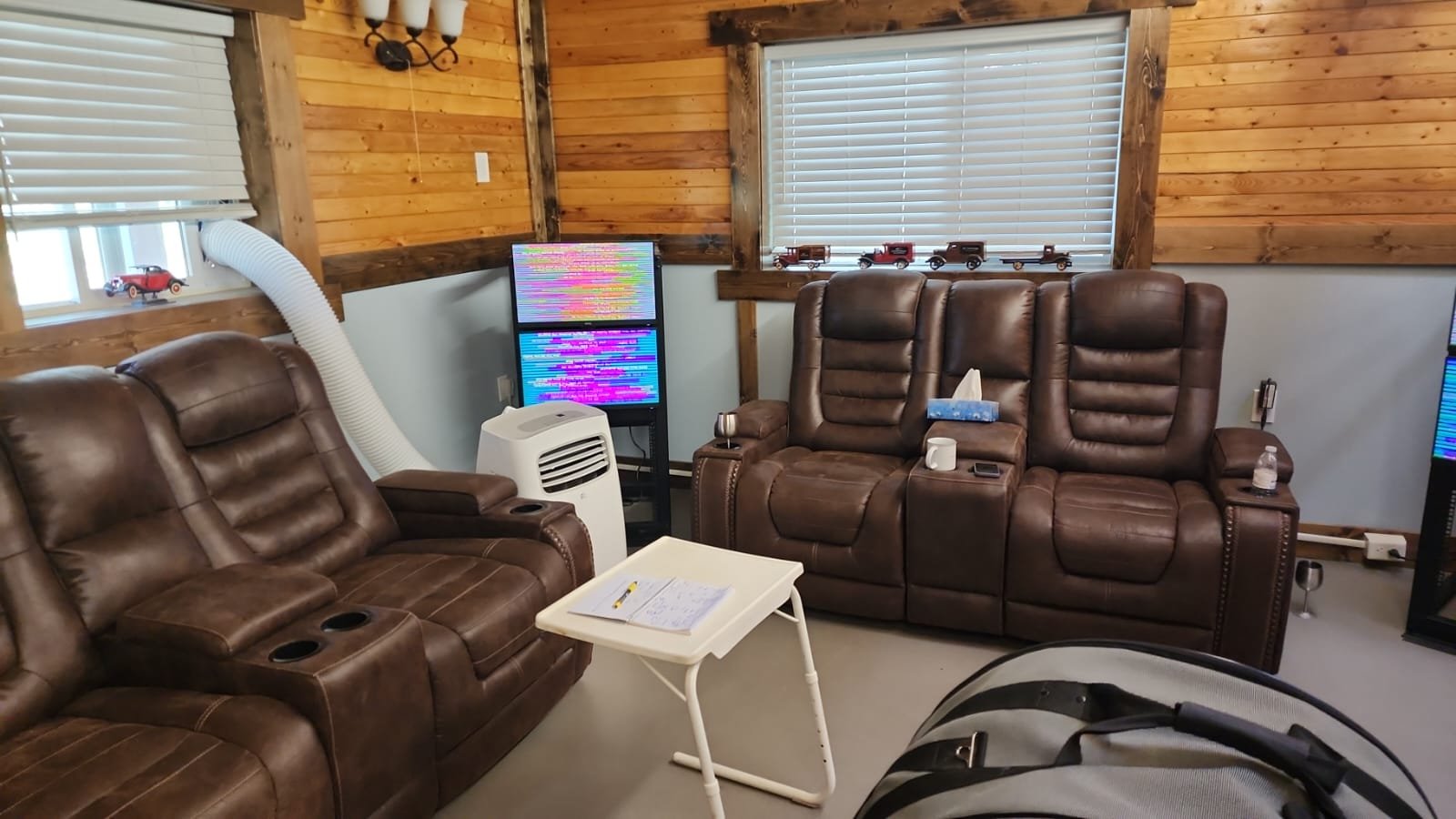 The EESystem room with reclining chairs and colourful screens